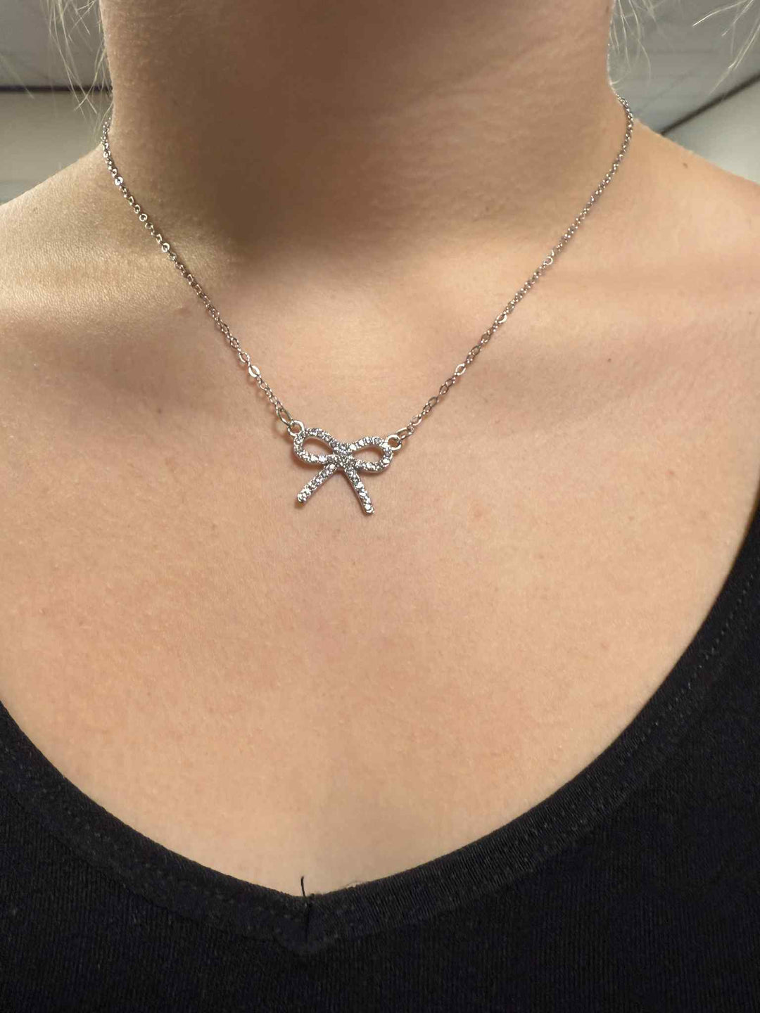 SILVER BOW NECKLACE