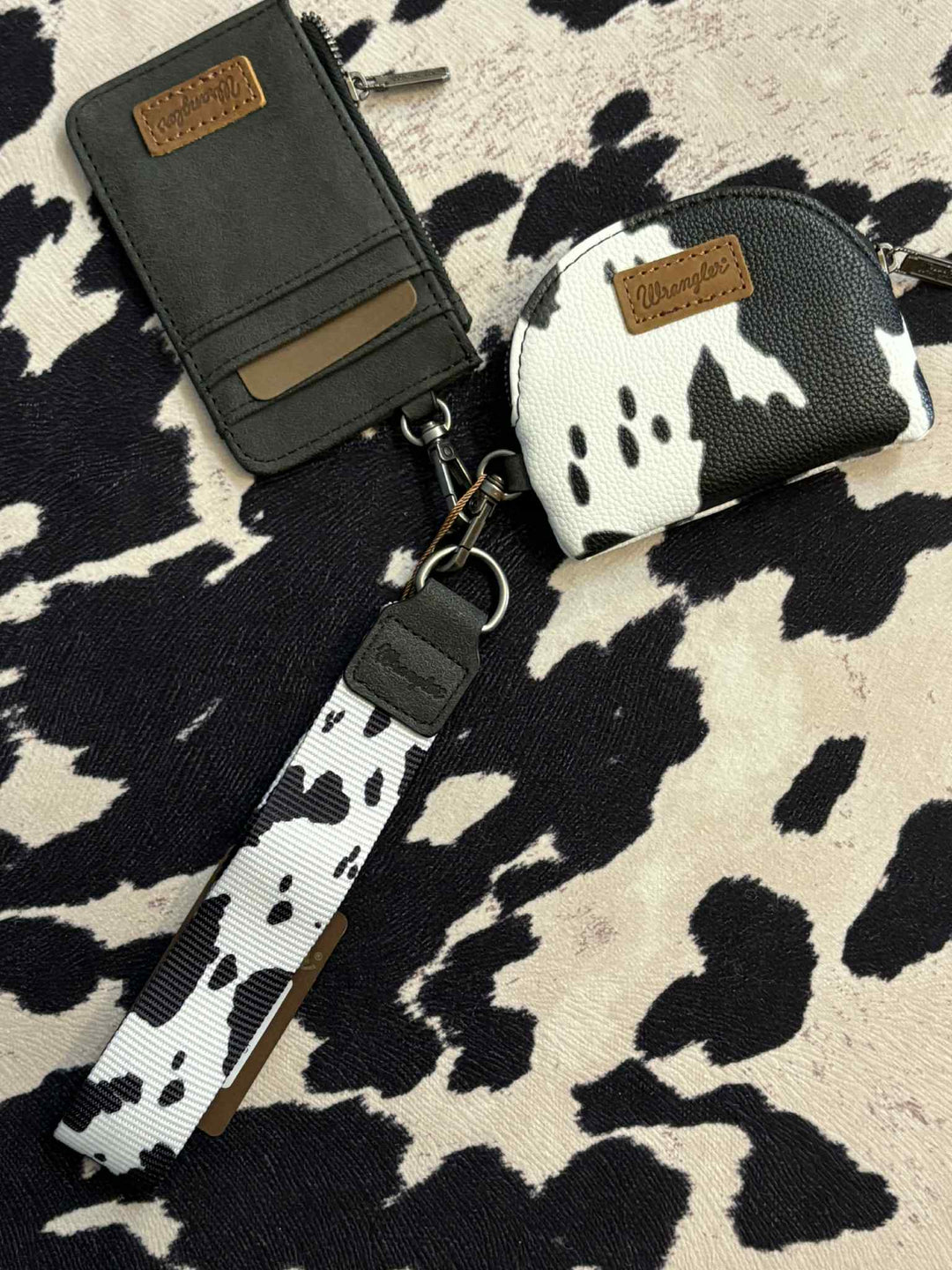 BLACK WRANGLER COW PRINT DUAL POUCH WRISTLET