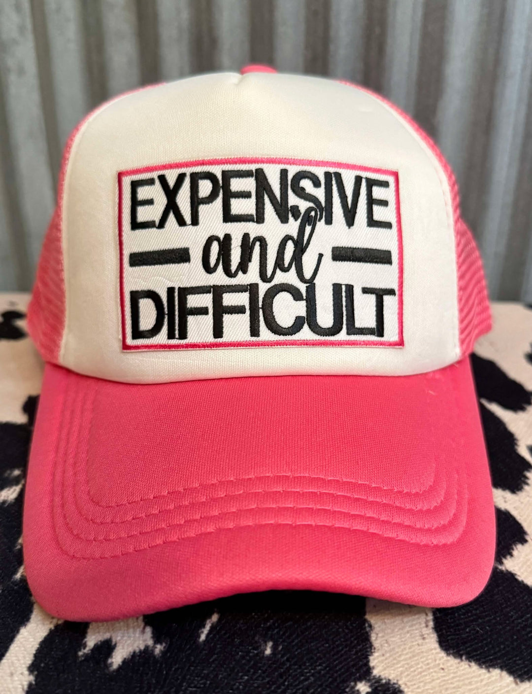EXPENSIVE AND DIFFICULT HAT