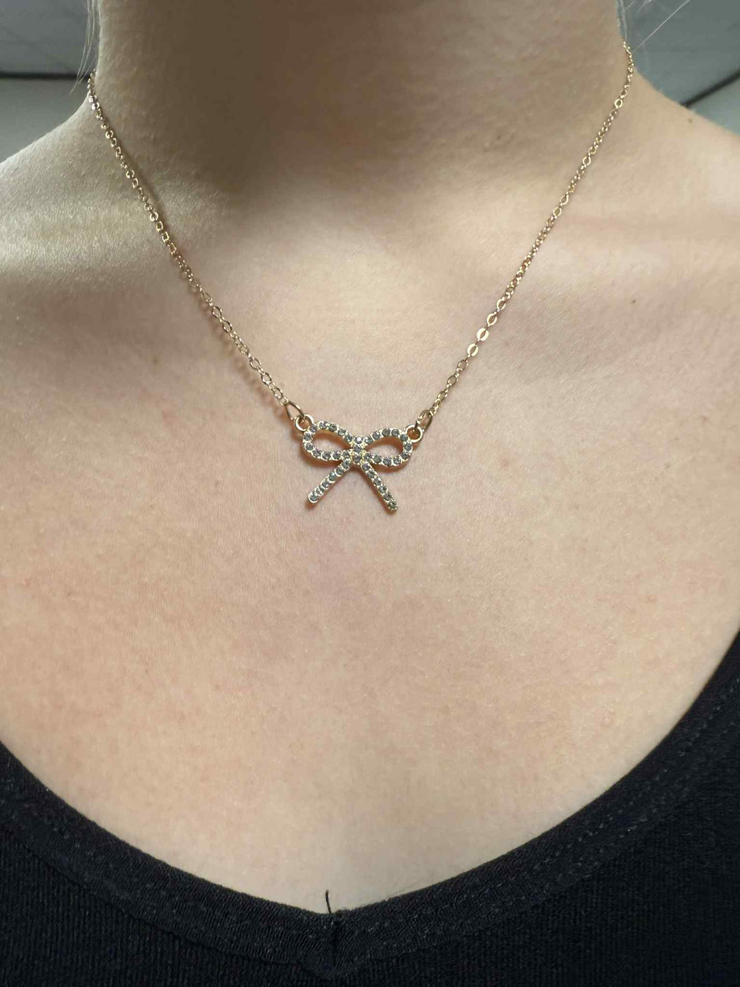 GOLD BOW NECKLACE