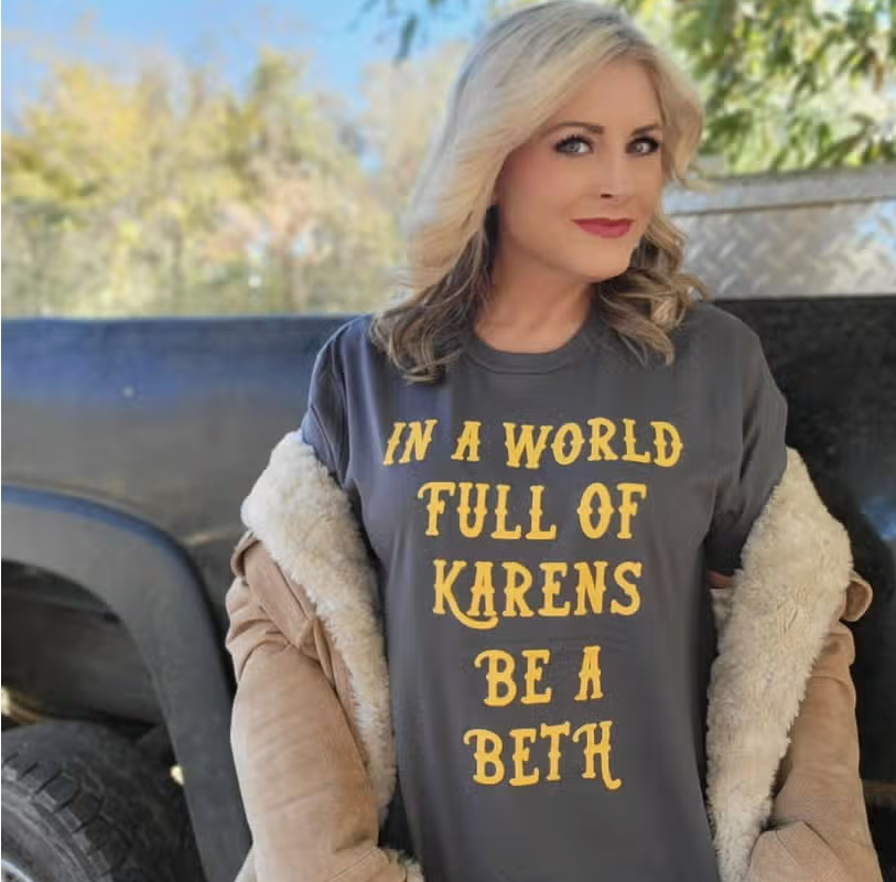 IN A WORLD FULL OF KARENS BE A BETH GRAPHIC TEE