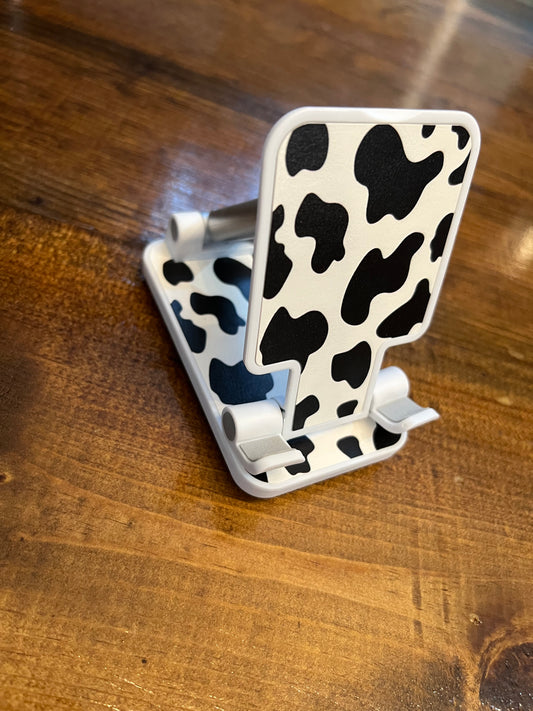 COW PRINT PHONE STAND